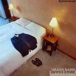travel 1-3 clothes on hotel bed
